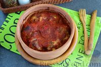 Фото к рецепту: Тефтели с моцареллой, запечённые в томатном соусе