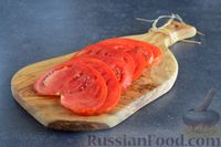 Фото приготовления рецепта: Закуска из батона с ветчиной и помидорами - шаг №4
