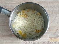 Фото приготовления рецепта: Аррош досе (рисовый пудинг с лимоном и корицей) - шаг №5