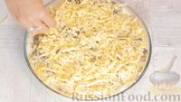 Фото приготовления рецепта: Лоранский пирог с грибами и курицей - шаг №12