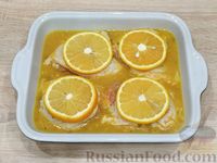 Фото приготовления рецепта: Запечённая курица с апельсинами - шаг №8
