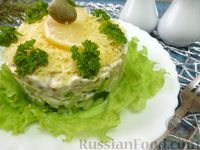 Фото приготовления рецепта: Слоёный салат с авокадо и оливками - шаг №10