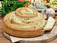 Фото приготовления рецепта: Хлеб "Спиральный" с чесноком и зеленью - шаг №13