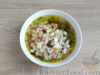 Фото приготовления рецепта: Суп с морской капустой и крабовыми палочками - шаг №10