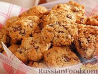 Фото к рецепту: Овсяное печенье с шоколадом и орехами