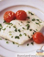 Фото к рецепту: Белая рыба, запеченная в вине