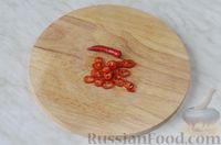 Фото приготовления рецепта: Кальмары в томатном соусе - шаг №9