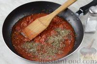 Фото приготовления рецепта: Кальмары в томатном соусе - шаг №13
