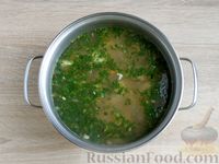Фото приготовления рецепта: Рыбный суп из минтая с картофелем - шаг №13