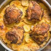 Фото к рецепту: Курица с картошкой в духовке