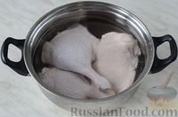 Фото приготовления рецепта: Утка, запечённая с квашеной капустой и рисом - шаг №2