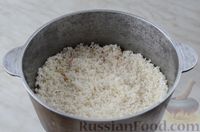 Фото приготовления рецепта: Утка, запечённая с квашеной капустой и рисом - шаг №5