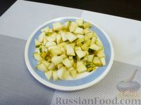 Фото приготовления рецепта: Фрикадельки из индейки, запечённые с овощным соусом - шаг №7