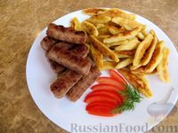 Фото к рецепту: Немецкие картофельные клецки с чесночными колбасками