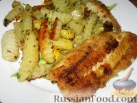 Фото приготовления рецепта: Рыба с картофелем - шаг №6