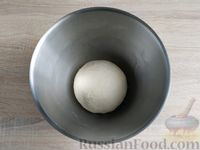 Фото приготовления рецепта: Минтай, тушенный в сметанном соусе (на сковороде) - шаг №16