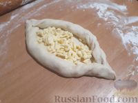 Фото приготовления рецепта: Аджарские хачапури "Лодочка" - шаг №14
