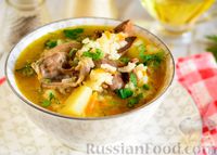Фото к рецепту: Суп с куриными потрошками и рисом