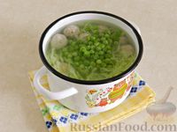 Фото приготовления рецепта: Суп с фрикадельками, капустой и зелёным горошком - шаг №9