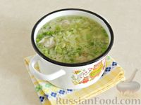 Фото приготовления рецепта: Суп с фрикадельками, капустой и зелёным горошком - шаг №10