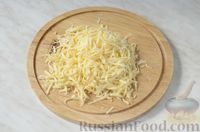 Фото приготовления рецепта: Минтай, запечённый с помидорами и сыром - шаг №7