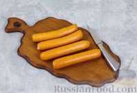 Фото приготовления рецепта: Сосиски в лаваше с сыром (на сковороде) - шаг №3