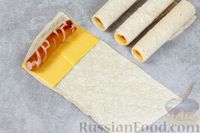 Фото приготовления рецепта: Сосиски в лаваше с сыром (на сковороде) - шаг №6