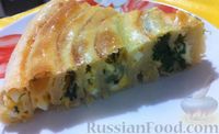 Фото к рецепту: Пирог "Улитка" с сыром и шпинатом