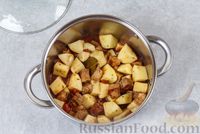 Фото приготовления рецепта: Картошка, тушенная с мясом и морковью - шаг №10