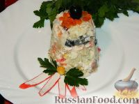 Фото к рецепту: Салат из кальмаров и рыбы "Гавань"