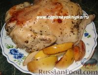 Фото к рецепту: Курица, запеченная целиком в мультиварке, с айвой