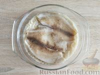 Фото приготовления рецепта: Рыба, запечённая с вермишелью и сыром - шаг №9
