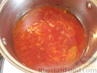 Фото приготовления рецепта: Тушёная рыба в томатном соусе - шаг №7