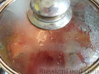 Фото приготовления рецепта: Тушёная рыба в томатном соусе - шаг №9