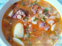Фото приготовления рецепта: Гороховый суп с копчёными свиными рёбрышками и овощами - шаг №11