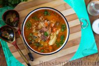 Фото приготовления рецепта: Рассольник по-ленинградски, с говядиной, рисом и томатной пастой - шаг №16