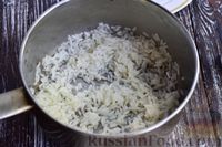 Фото приготовления рецепта: Салат с крабовыми палочками, кальмарами и рисом - шаг №3