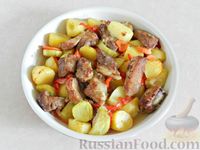 Фото приготовления рецепта: Свинина с овощами в духовке - шаг №9