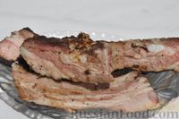 Фото приготовления рецепта: Свиные рёбра в медово-чесночном маринаде (на мангале) - шаг №10