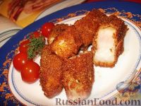 Фото к рецепту: Рыбные палочки в папрично-сырной панировке