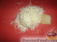 Фото приготовления рецепта: Полпеттоне с начинкой из  ветчины  и сыра - шаг №3