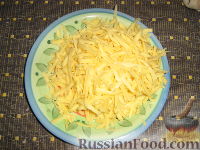 Фото приготовления рецепта: Полпеттоне с начинкой из  ветчины  и сыра - шаг №10