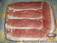 Фото приготовления рецепта: Полпеттоне с начинкой из  ветчины  и сыра - шаг №9