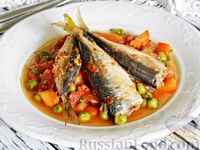 Фото к рецепту: Рыба, тушенная с овощами и зелёным горошком