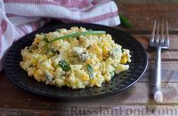 Фото к рецепту: Салат с мидиями, рисом, кукурузой и яйцами