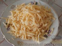 Фото приготовления рецепта: Кабачки с картофелем и помидорами, запеченные в духовке - шаг №16