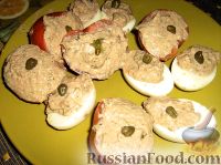 Фото к рецепту: Фаршированные яйца и помидоры