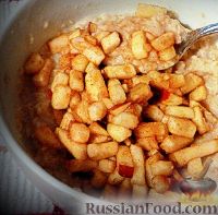 Фото к рецепту: Печеные яблоки с орехами и изюмом