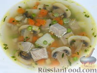 Фото приготовления рецепта: Суп из свинины с шампиньонами и горошком - шаг №13