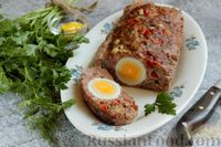 Фото к рецепту: Мясной хлеб с кабачками и помидорами, фаршированный вареными яйцами